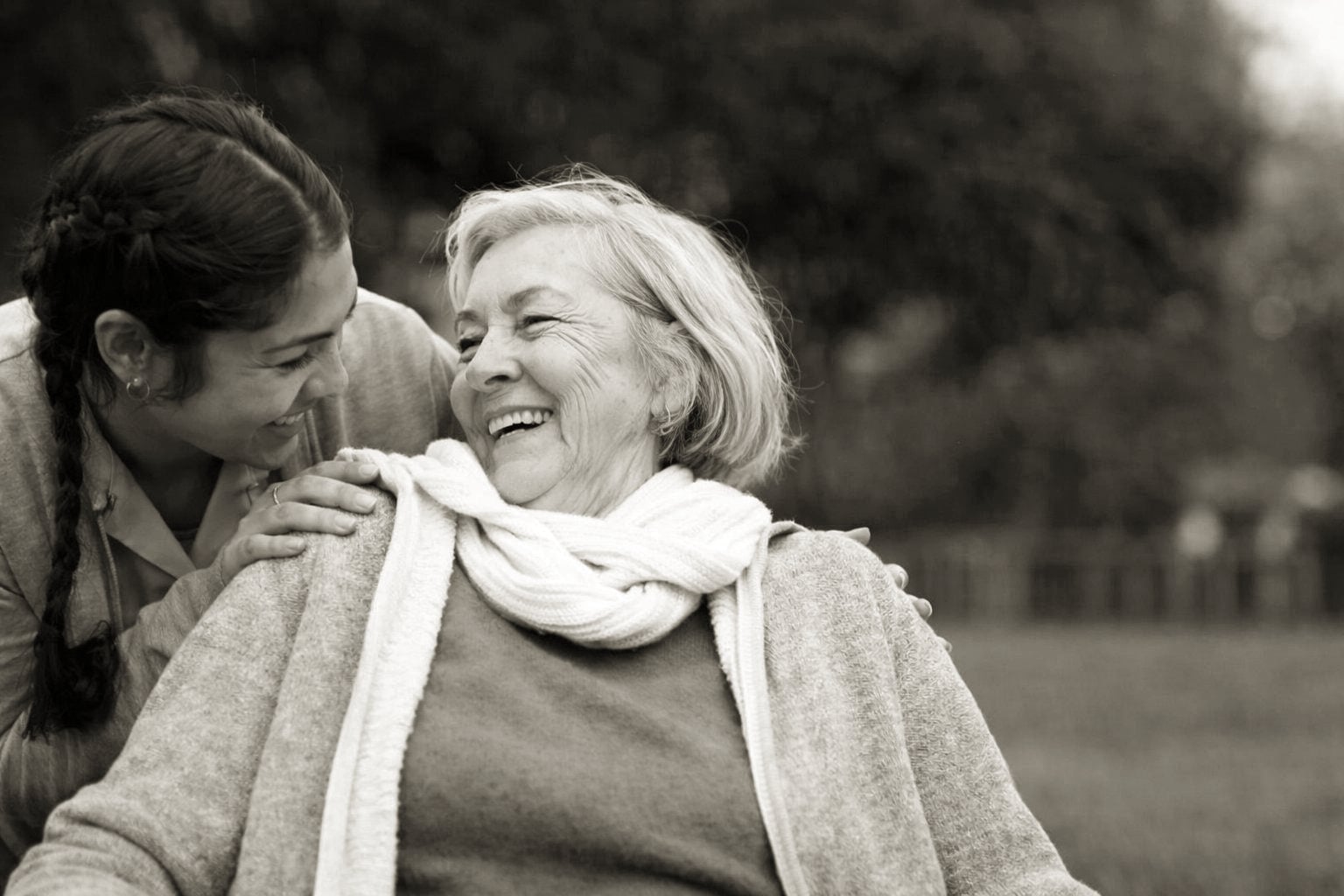 A SAL caregiver outdoors with a client